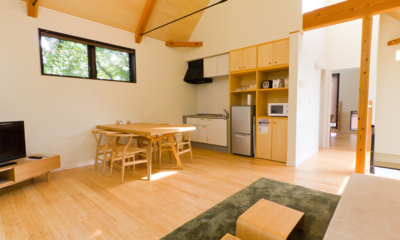 Gakuto Villas Living, Kitchen and Dining Area with TV | Hakuba Valley