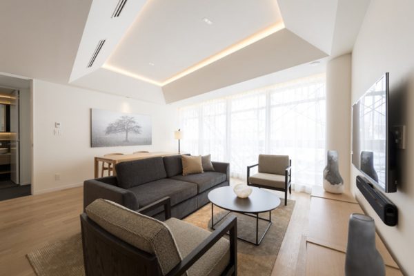 Skye Niseko Two Bedroom Suite Living Area with Wooden Floor | Upper Hirafu Village