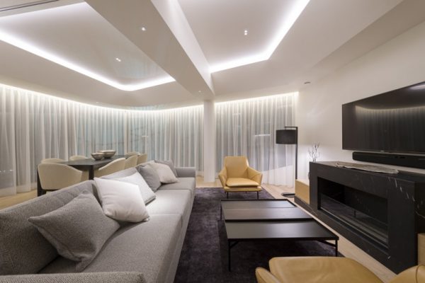 Skye Niseko Four Bedroom Suite Living Area with TV and Carpet | Upper Hirafu Village