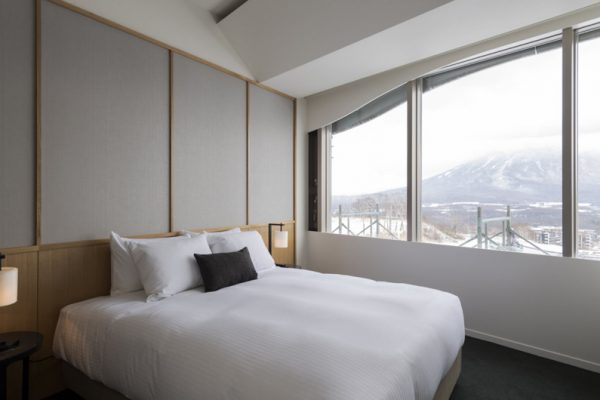 Skye Niseko Four Bedroom Suite Bedroom with Mountain View | Upper Hirafu Village
