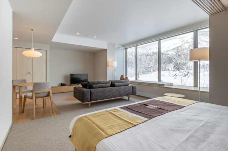 The Maples Niseko 32 Studio Room Mountain Bedroom with Sofa and TV | Upper Hirafu