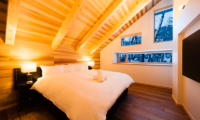Asagiri Chalet Bedroom with Wooden Floor | Upper Wadano