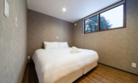 Mizuho Chalets Bedroom with Wooden Floor | Happo Village