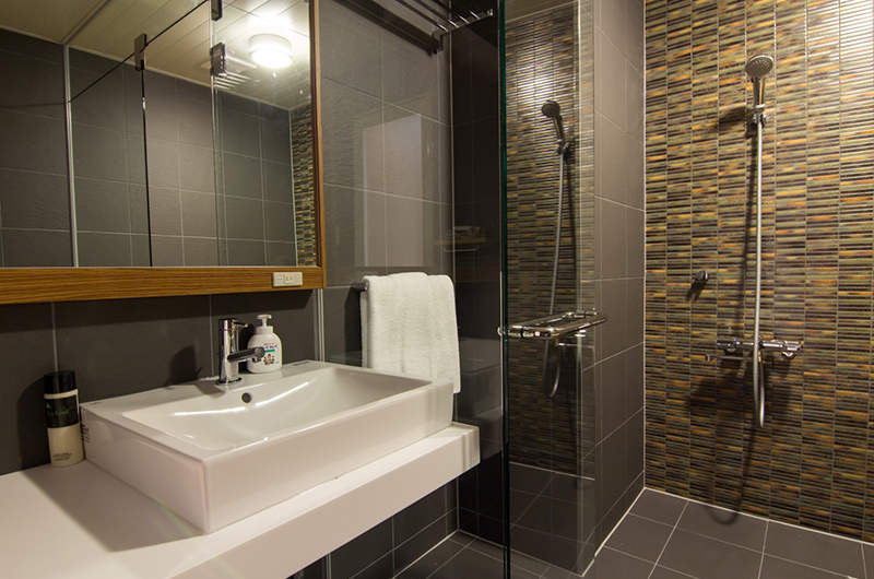 Koharu Resort Hotel & Suites Bathroom with Shower | Upper Wadano