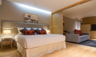 Koharu Resort Hotel and Suites One Bedroom Apartment Bedroom with Sofa with Wooden Floor | Upper Wadano