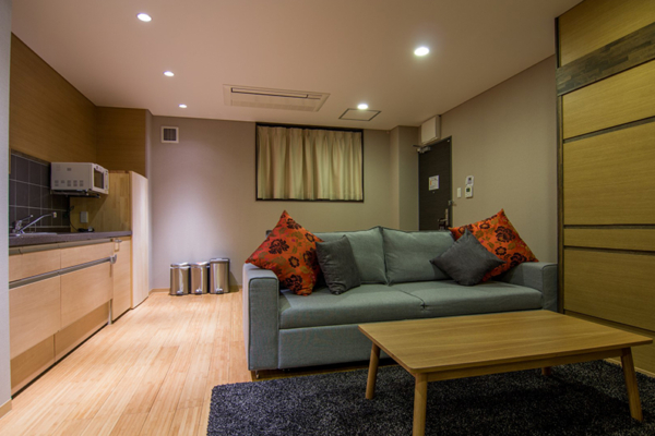 Koharu Resort Hotel and Suites Superior One Bedroom Apartment Living and Kitchen Area | Upper Wadano
