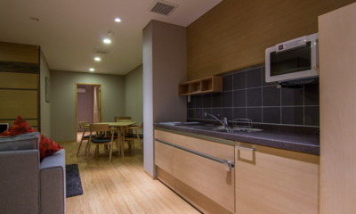 Koharu Resort Hotel and Suites Superior One Bedroom Apartment Living, Kitchen and Dining Area | Upper Wadano