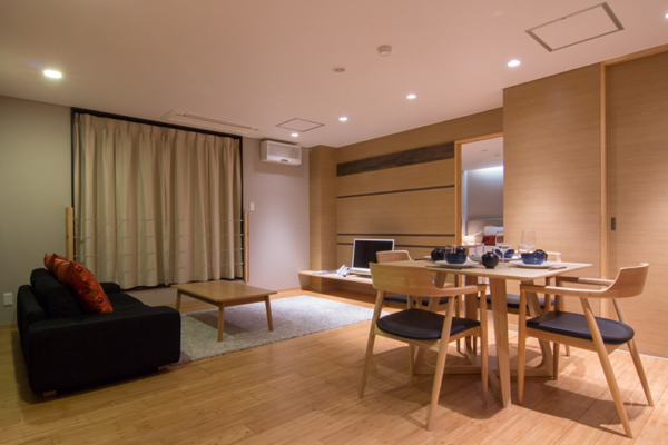 Koharu Resort Hotel and Suites Two Bedroom Apartment Living and Dining Area | Upper Wadano