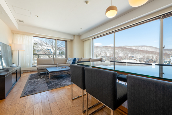 Chatrium Niseko Three Bedroom Annupuri Living and Dining Area with View | Upper Hirafu