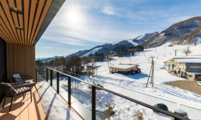 Roka five bedroom penthouse outdoor deck with deck chairs, ski slope view | Happo Village, Hakuba