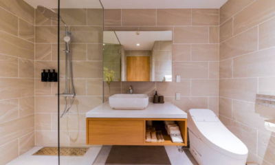 Roka five bedroom penthouse bathroom pink tile shower | Happo Village, Hakuba