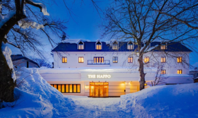 The Happo hotel external view in snow, evening | Happo Village, Hakuba