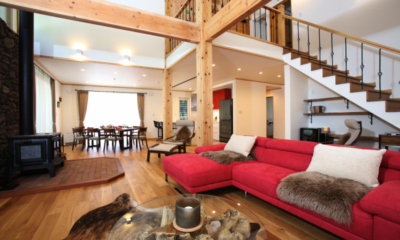 Hakuba Villa Bavaria living room with sofa, feature coffee table, fireplace | Echoland, Hakuba